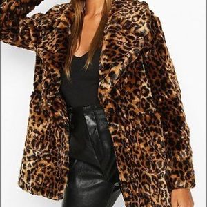 Brand new leopard waist coat.